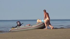 Blonde MILF gives a bj and shows off her round ass at the beach