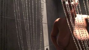 Watch Krystal Swift massaging her giant boobs in the shower