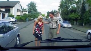 Natural titted German lady pleasing a cock in the back of the car