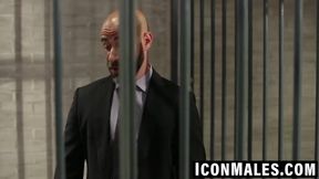 Mature inmate fucks twink hard against prison cell bars