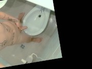 Naked peeing in the bidet