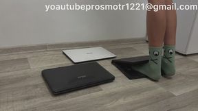 Nastya walks around and tramples on three laptops, first in socks, then barefoot, then in dirty sneakers, and then in heels. She destroys them, steps on them, pops out the keys, breaks the screen.