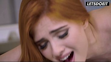 Curvy redheaded babe gags on cock in kitchen doggy style