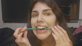 Teeth fetish: bitting a pencil
