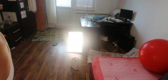 Amateur wife dancing naked at home. Amateur woman has fun trying on clothes and cutting them.