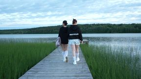 two beautiful girls share one big cock on the dock after sup session
