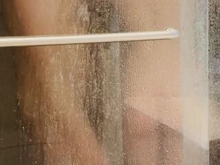 Young Couple Showering