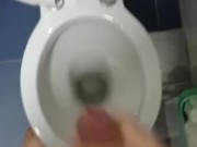 Spraying the toilet seat.