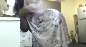 African Stepmum Stripteasing and Masturbating at Then Kitchen