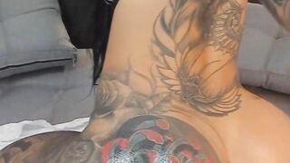 Tattooed Cougar With An Amazing Round Ass