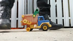 Security Guard crushing Toy Truck