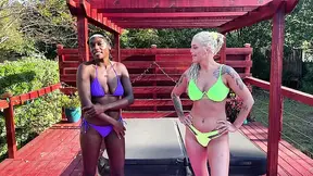 Paris Love takes on skilled wrestler Andi Wild in a topless, sweaty match.