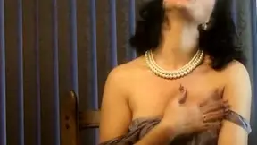 Brunette Darling smoking and posing nude