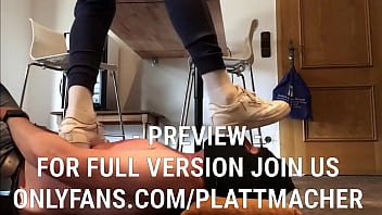 Master trampling without mercy on the human doormat in Reeboks