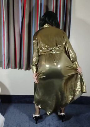 Hot crossdresser in erotic gold metallic gown