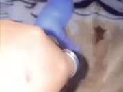 Kitten playing with the cat with her tail in