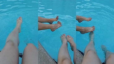 Relaxing my feet at my pool