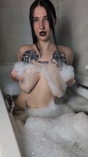 Naughty fingering in the bath!