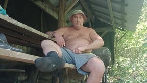 The big pig drinks his piss, shows off his curves, panards and stinking socks before jerking off by the river