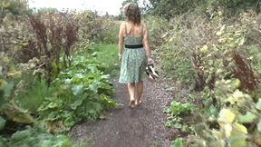 Zoe wandering barefoot along muddy path