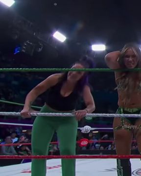 Busty Latina celebrity shows off her natural big ass in a wrestling match