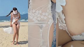 beautiful girl flashing her pretty pussy on the beach