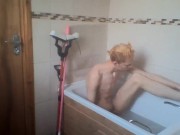 sexy skinny blonde teen takes a bath and wets his hair and cock
