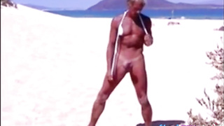 Tanned guy on beach in tiny string thong (temporarily!) 7