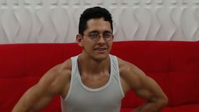 Cute Lean Guy with Glasses Flexes His Muscles