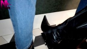 Exciting boot footsie under the table