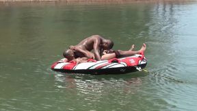 Energized black lovers get intimate by the lake in sunny perversions