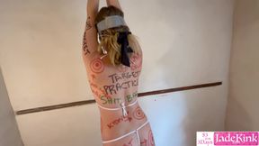 Submissive dump whore humiliated with body writing and foam spray