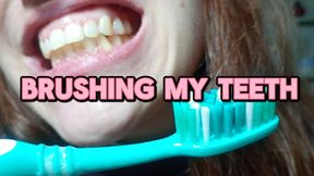 I brush my teeth, while saliva drips from my mouth.
