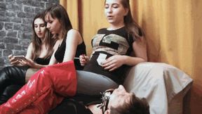 0176 Three Mistresses Bertie, Julia and Lexy look at the mouth of the slave, it is full of ash after cigars and saliva