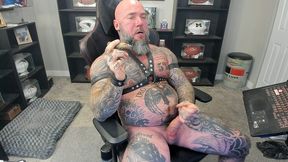 jason collins jerking off while smoking a cigar in leather with a massive cum shot!