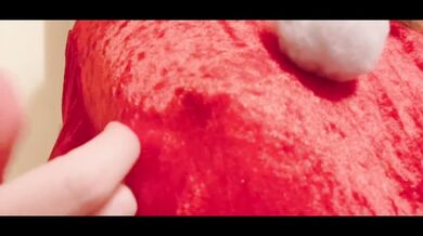 Christmas 2022, clitoris bare standing masturbation in Santa cosplay.