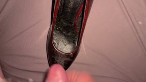 Cumming on red and black patents