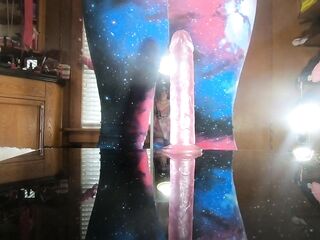 Trans bitch Daphne screws herself on the table with her pink sex-toy