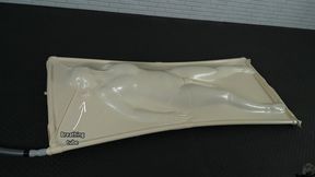 A girl has an orgasm from a vibrator while lying inside a white vacuum bed with a breathing tube (UHD 4K MP4)
