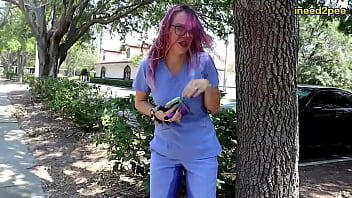 Nurse Vicki Vixx wetting her nurse scrubs outside omorashi