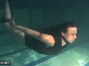 Shaved brunette sissy Irina Polcharova naked in the pool