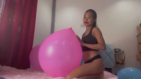 Looner Camylle Sits To Pop Your Huge Pink And Blue Balloons