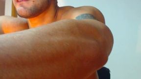 Highly Muscled Latino Plays with His Stick