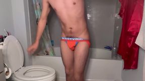 Asian twink tries to sneak pee but starts with jockstrap off and mates hear