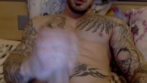 Tattooed Stud Strokes His Hard Cock