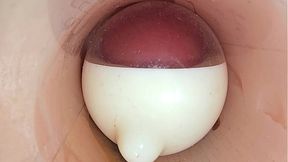 The camera in the deep pussy records a huge ejaculation of sperm into the condom