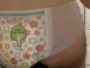 Diaper boy rides K9 dildo in a goodnights diaper