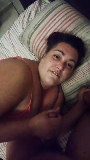 Busty wife gives her husband a handjob