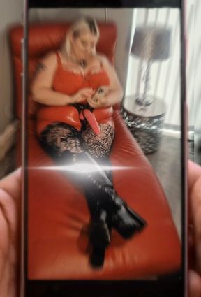 Peggy DeVille films cock slut worshipping her boots and strap on for content