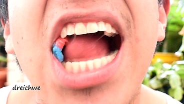 Eating worm gummies in my garden